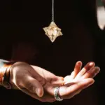 a person holding a key chain